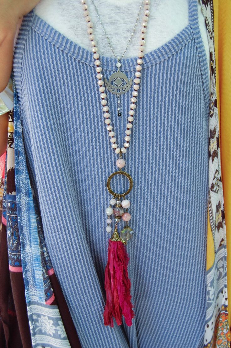 The Nadia O-Ring Tassel Necklace in Pink ♡ Product Highlights ♡ Our Nadia O-Ring Tassel Necklace in Pink is the perfect accessory to add to any on-trend bohemian style outfit! Layered with any of our many statement necklaces, of your choosing, the Nadia O-Ring Tassel Necklace in Pink will be sure to be a wonderful addition to any necklace layering style! ✁ Contents & Measurements ✁ Our Nadia O-Ring Tassel Necklace in Pink features: • A 36-inch-long gemstone beaded necklace chord. • An inch and a Jewelry Maximalist, Pearl Jacket, Layering Style, Bohemian Style Clothing, Project List, Hand Dyed Fabric, Iconic Dresses, Necklace Layering, Gemstone Beaded Necklace