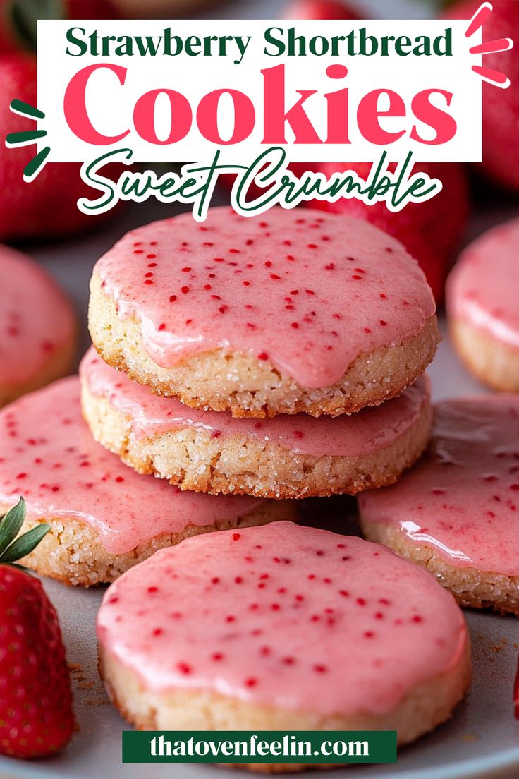 strawberry shortbread cookies with pink frosting on a plate