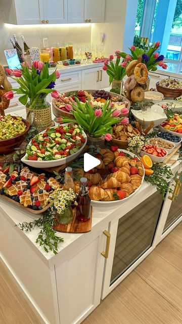 a kitchen counter filled with lots of food on top of it's white counters