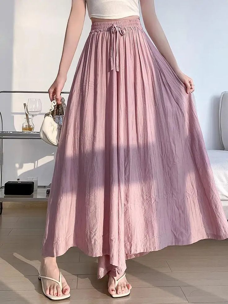 Flowing Pink Maxi Skirt with Waist Tie Pink Maxi Dress With Elastic Waistband For Spring, Casual Pink Maxi Dress With Elastic Waistband, Spring Flowy Maxi Dress With Pleated Waist, Spring Pleated Waist Flowy Maxi Dress, Spring Flowy Skirt Maxi Dress With Pleated Waist, Feminine Flowy Maxi Skirt With Elastic Waistband, Feminine Maxi Skirt For Spring, Pink Maxi Dress With Elastic Waistband For Summer, Chic Pink Maxi Dress With Flowy Skirt