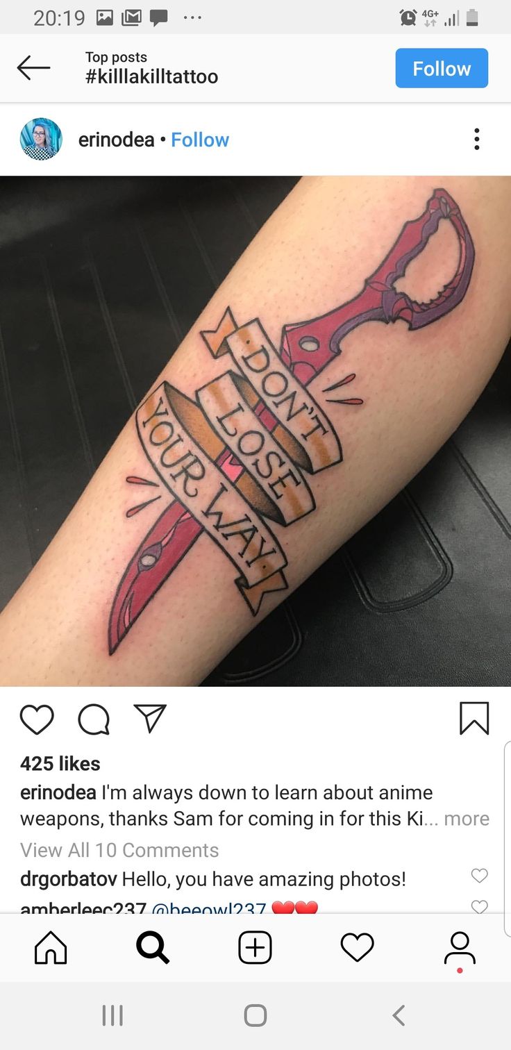 a person with a tattoo on their arm holding a pair of scissors and the words work hard