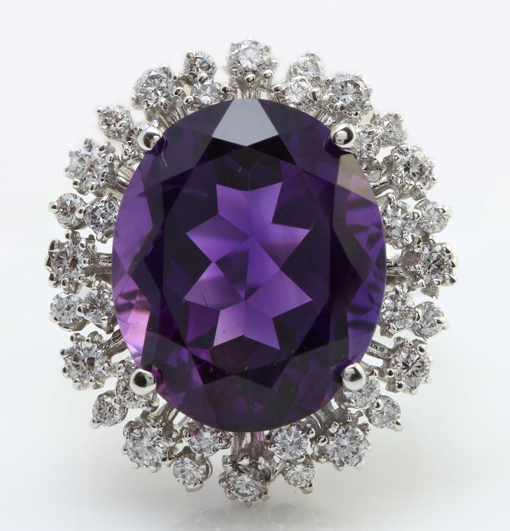 11.20 Carat Natural Purple Amethyst and Diamond Women Ring Made in 14K Solid White Gold Suggested Retail Value $5,999.00 Total Natural Amethyst Weight is - 10.00 carat Amethyst Measurements are - 16.00 x 12.00 Gold Purity: 14K Round Diamonds Carat Weight is - 1.20 Carat Clarity: SI1 Color: G-H RING SIZE: 6 (FREE SIZING AVAILABLE) RING WEIGHT IS 7.9g Disclaimer: All weights, measurements and colors are approximate and may vary slightly from the listed dimensions or as seen in the image'' Thanks for looking and good luck! Luxury Formal Hallmarked Gemstones, Luxury Purple Gemstones With Halo Setting, Oval Amethyst Gemstones For Formal Occasions, Luxury White Gold Amethyst Ring, Luxury White Gold Amethyst Ring With Halo Setting, Luxury Amethyst Ring With Halo Setting, Luxury Oval Amethyst Platinum Ring, Luxury Amethyst Gemstones With Prong Setting, Luxury Purple Platinum Rings