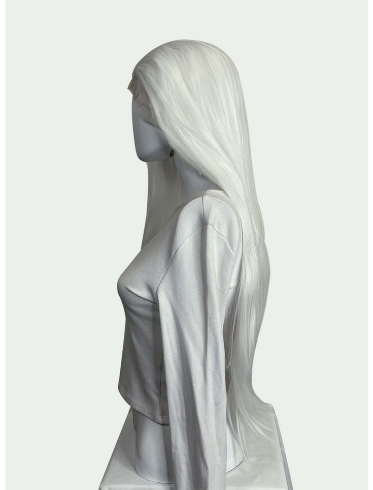 a white female mannequin with long hair