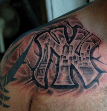 a man with a castle tattoo on his chest