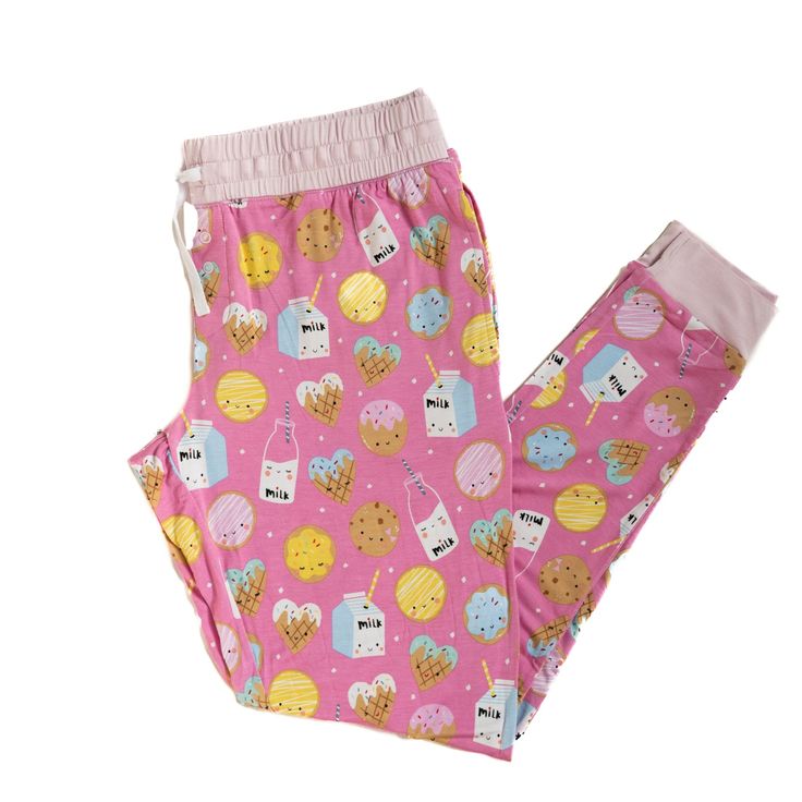 Go ahead mama, you deserve a sweet treat. Featuring sleepy and smiley cookies & milk on a light pink background, these jogger-style PJ Pants are made from our signature Lunaluxe™ Bamboo. Designed by a mama, they feature stretchy ankle cuffs and pockets deep enough for a few cookies. Pair it with the matching top to complete the set, then snag styles for the whole fam! Made from custom-milled Lunaluxe™ Bamboo that’s gentle on sensitive or eczema-prone skin Seasonless fabric keeps you cool in the Playful Pink Sleepwear With Relaxed Fit, Playful Pink Relaxed Fit Sleepwear, Sweet Pink Sleepwear For Loungewear, Sweet Pink Sleepwear, Playful Cotton Joggers For Loungewear, Playful Relaxed Fit Sweatpants For Loungewear, Trendy Pink Sweatpants For Lounging, Playful Pink Bottoms For Sleepover, Pink Cotton Sweatpants For Pajama Party