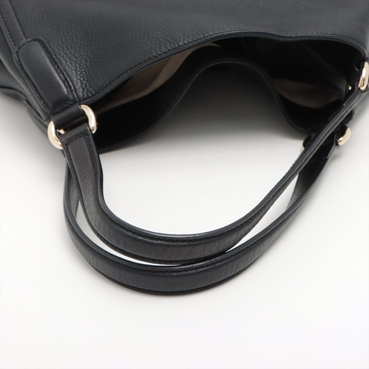 Discover enduring elegance with our second-hand Gucci Hobo Shoulder Bag in supple black leather. In excellent condition, it effortlessly elevates any outfit. A hobo silhouette adds a relaxed but sophisticated vibe. For the woman who values both luxury and ethical shopping.Brand: Gucci Size: Width: 22cm Height: 26cm Depth: 13cm Delivery 5-8 or 10-15 working days Please note that during high season and Sale period, delivery times may be affected We accept payment with a Credit card, Debit card, or PayPal.Note: Our Items are totally New High quality Brand Inspired Refurbished. Please make sure you are well aware of it before buying any of the Item. T&C's Apply in case of refunds.Please send us message on below chat to confirm availability. We will send the Refurbished Model in case you place Chic Business Hobo Bag With Leather Handles, Timeless Hobo Bag With Gold-tone Hardware For Office, Classic Hobo Bag With Leather Handles For Office, Classic Office Hobo Bag With Leather Handles, Timeless Black Hobo Bag For Business, Formal Leather Hobo Bag With Handle Drop, Elegant Leather Hobo Bag With Smooth Grain, Black Hobo Bag With Gold-tone Hardware For Workwear, Timeless Hobo Bag With Smooth Grain