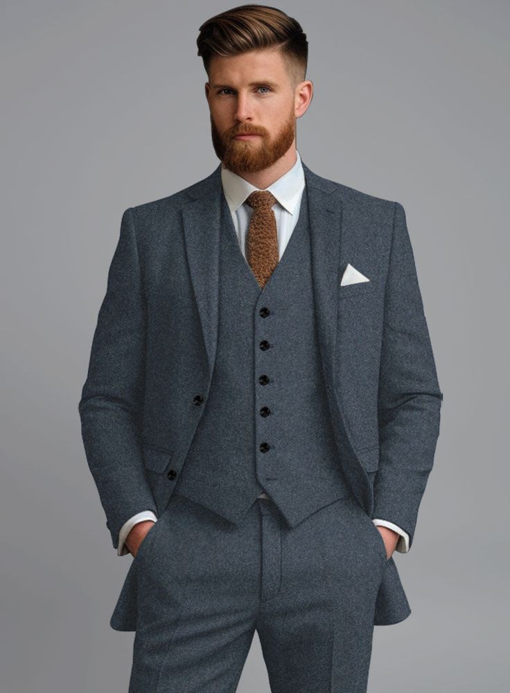 Opt for our Light Weight Bond Blue Tweed jacket and have your evening wear elevated to truly sophisticated style. Crafted from pure wool, tweed jackets are appropriate for colder months as the material not only looks structured and professional but also keeps you warm. Wear it with a matching waistcoat and trousers, a crisp white shirt and dark brown derby shoes.  Look Includes   Light Weight Bond Blue Tweed Fabric  Two Button Jacket Style  Notch Lapel  Horn Royal Black Buttons  Single Vent  Thr Semi-formal Winter Tweed Three-piece Suit, Winter Semi-formal Tweed Three-piece Suit, Wool Three-piece Suit With Welt Pockets For Winter, Fitted Tweed Suit With Long Sleeves, Elegant Tailored Tweed Three-piece Suit, Winter Formal Tweed Three-piece Suit, Winter Three-piece Suit With Long Sleeves, Formal Tweed Blazer With Suit Collar, Wool Three-piece Suit For Winter Formal