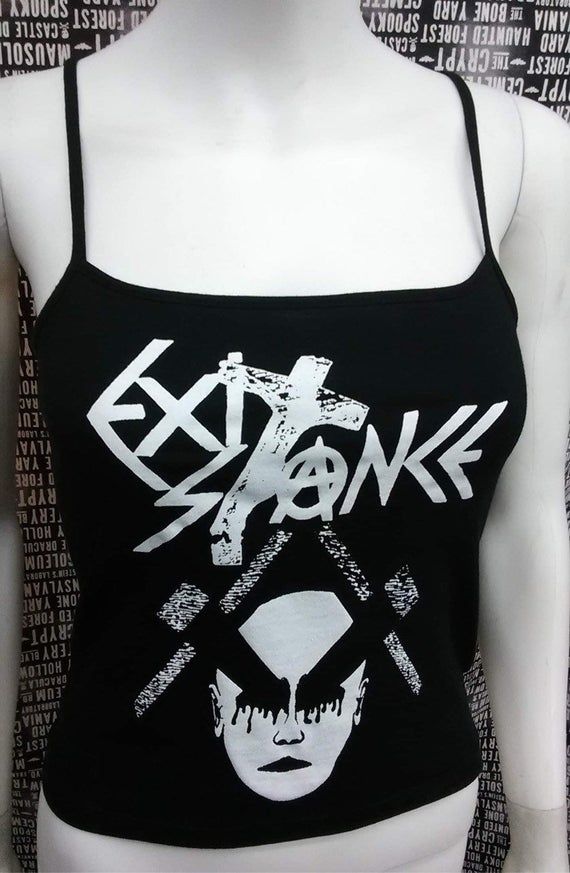 This is a black Exit-Stance crop tank top with spaghetti straps. This has a Exit-Stance image screen printed on the front. 57% cotton/ 38% polyester/ 5% SpandexThese are handmade screenprinted and slightly vary from the photo. Please feel free to email me any questions. Thanks for looking.Due to an influx of incorrect addresses if a package is returned,  you must pay the shipping cost to resend the item to you.I do not do exchanges and I do not take returns unless the item is damaged. I thorough Y2k Outfit Ideas, Black Cami Top, Black Cropped Tank, Black Crop Top Tank, Flowy Mini Dress, Print Tank Top, Top Summer, Girls Rock, Print Tank