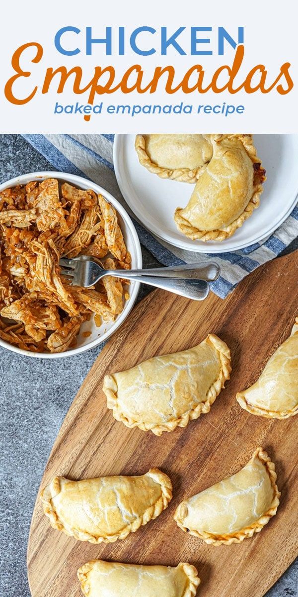 chicken empanadas on a cutting board with other food