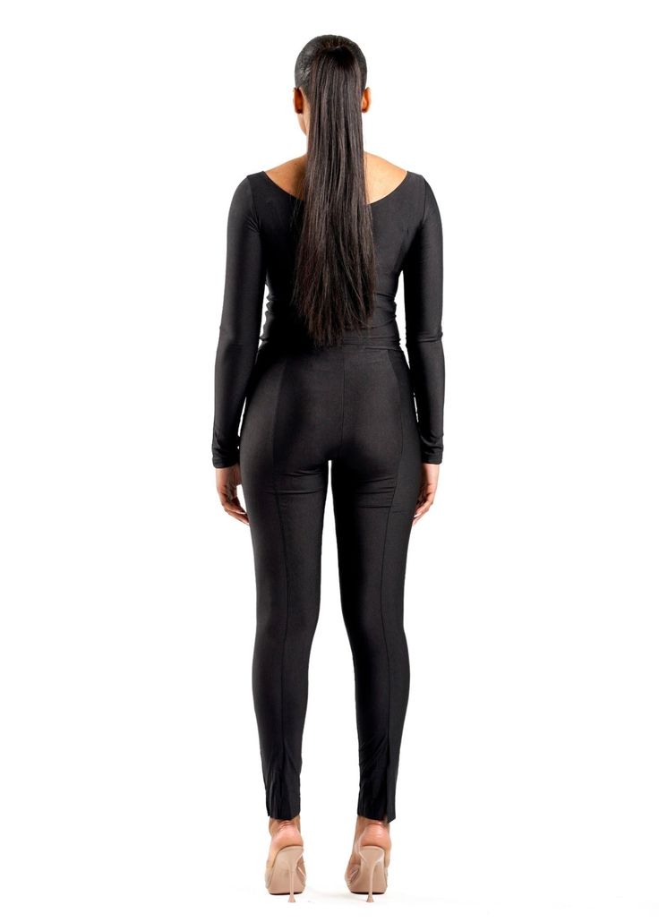 This set includes a long-sleeve, fitted top with a wrap-around detail, offering a flattering accent to the neckline and waist. The sleek, snug sleeves extend to partially cover the hands, adding a modern touch. The matching high-waisted leggings are designed to hug the body, featuring subtle vertical seams that enhance and elongate the legs. Polyester 95% Elastane 5% Model wears a size 'S' Fitted Top, Brown Silver, High Waisted Leggings, The Body, Workout Tops, Black And Brown, Sleek, High Waisted, Leggings