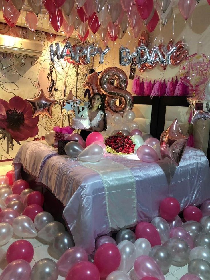 a birthday party with balloons and decorations