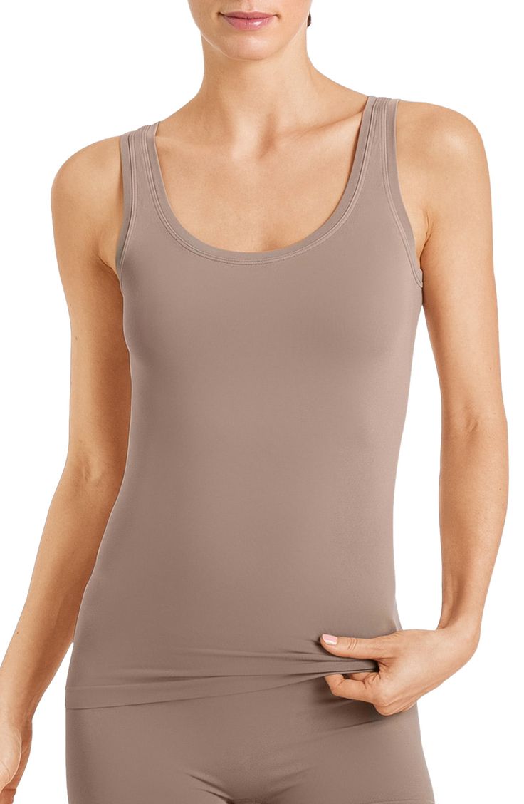 This seamless tank cut from buttery-soft microfiber comfortably stays in place and is perfect for layering. Style Name:Hanro Touch Feeling Tank. Style Number: 174618. Seamless Scoop Neck Tank Top With Medium Support, Seamless Medium Support Scoop Neck Tank Top, Scoop Neck Tank Top With Minimal Stretch, Stretch Camisole With Soft Touch, Solid Stretch Camisole With Soft Touch, Stretch Seamless Camisole For Everyday, Solid Color Stretch Camisole With Soft Touch, Stretch Soft Touch Camisole Top, Stretch Camisole Top With Soft Touch