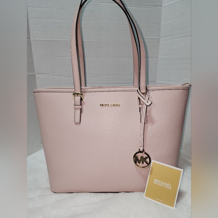 Michael Kors Large Pink Tote Bag 100% Authentic Dimensions: 17" Width X 10" Height With 9 1/2 Handle Drop If You Have Any Questions, Let Me Know Pet And Smoke-Free Home Thank You For Looking Classic Pink Bag With Dust Bag Included, Classic Pink Shoulder Bag, Classic Pink Shopping Bag, Classic Pink Travel Bag, Pink Michael Kors Shoulder Bag With Handles, Classic Pink Michael Kors Bag, Classic Pink Bags For Everyday Use, Classic Pink Bag For Everyday, Classic Pink Shoulder Bag For Travel