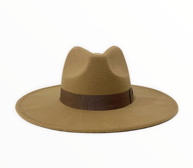 TORI® - WIDE BRIM FEDORA - BROWN Introducing our new Tori® line of women's fedoras, which feature an enlarged brim compared to a traditional fedora, as well as a stylish handstitched bowtie headband Handcrafted from a blend of wool and polyester fabrics Adjustable inner-headband to ensure the proper fit Available in sizes: Medium 56-58cm and Large 58-60cm FREE shipping on every order Packaged with care - unlike the competitors, our hats are shipped in an innovative inflated package to eliminate Womens Fedora, Wide Brim Fedora, Fedora Hat, Wide Brimmed, Hand Stitching, Fedora, Polyester Fabric, Wool, Hats