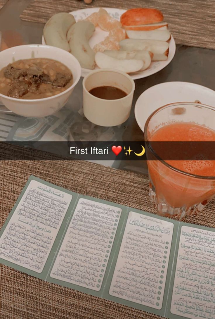 a table topped with lots of food next to cups and sauces on top of plates