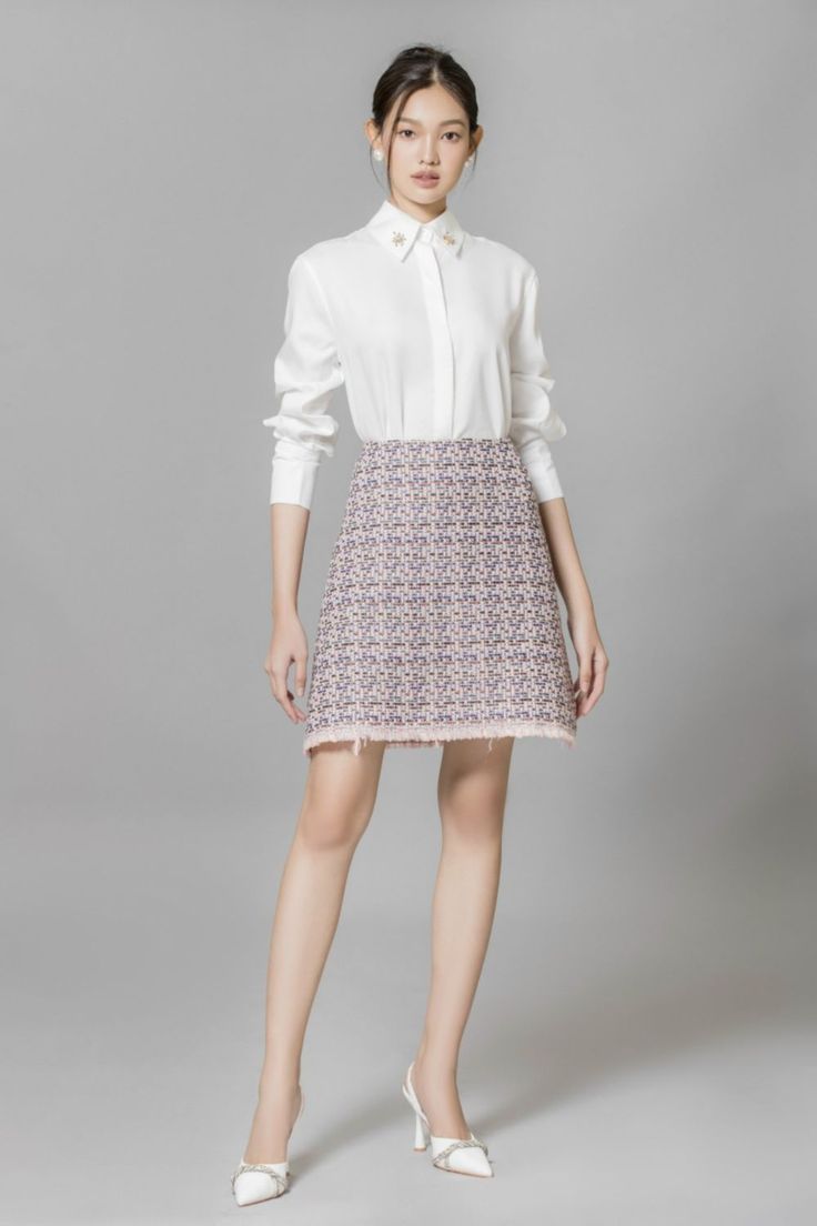 Crafted with the finest materials, this skirt exudes elegance and sophistication. The high waist design flatters your figure while the A-line silhouette adds a touch of femininity. Perfect for any occasion, elevate your style with this exclusive piece. Mean Blvd, Tweed Mini Skirt, Tweed Fabric, Designer Collection, Formal Occasion, Online Fashion, Cotton Shirt, Latest Fashion Trends, Sleeve Styles