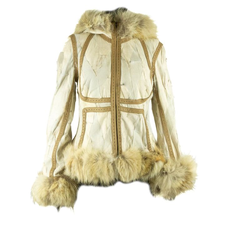 This jacket was featured on the runway for Alexander McQueen’s 2003 fall/winter ready to wear collection, Vogue called the collection ‘Eurasian ethnic into punk’. This jacket is constructed of different sized pieces of real fur that has been sewn with the fur facing inside in a patchwork method. The inside includes pieces of white, brown and speckled grey short pile fur, while the outside is beige suede. The jacket is also topstitched in taupe leather accents along the bodice and sleeves. It has Trashion Fashion, Glamour Clothing, Winter Ready To Wear, Dream Wishlist, Cosmograph Daytona, Taupe Leather, Emo Outfits, Ready To Wear Collection, Leather Accents