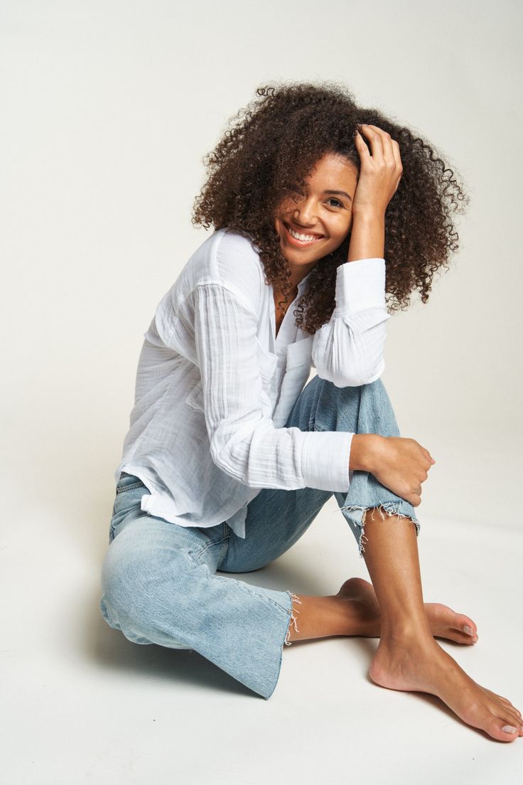 Puts a whole new meaning to "jeans and a nice top." PRODUCT DETAILS Oversized women's button-up top with a proper collar, chest pockets, and a cuffed wrist. Made from soft, 100% recycled & organic cotton that’s easy on the skin. Finally, a shirt you can actually dress up or down. SKU: WEL-120-021 Color: Cloudscape FABRIC & CARE 100% COTTON TURN INSIDE OUT AND WASH ON COLD CYCLE. DO NOT USE BLEACH. TUMBLE DRY LOW. EASY-PEASY. Relaxed Fit Blouse With Button Cuffs For Casual Gatherings, Versatile Tops With Button Cuffs And Relaxed Fit, Versatile Relaxed Fit Tops With Button Cuffs, Casual Tops With Button Cuffs For Layering, Relaxed Fit Wrinkle-resistant Button-up Shirt, Cotton Button-up Wrinkle-resistant Top, Organic Cotton Relaxed T-shirt, Indigo Washed Button-up Top, Indigo Relaxed Fit Button-up Shirt