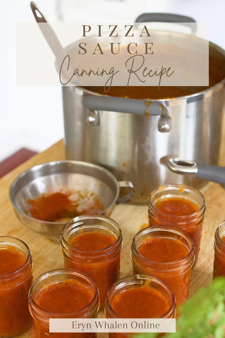 pizza sauce canning recipe in small glass jars on a cutting board with utensils