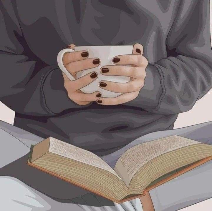 a woman is holding a cup and reading a book