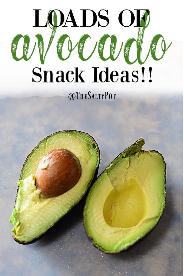 an avocado cut in half with the words loads of avocado snack ideas