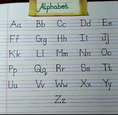 an upper and lower case alphabet written in cursive writing on a piece of paper