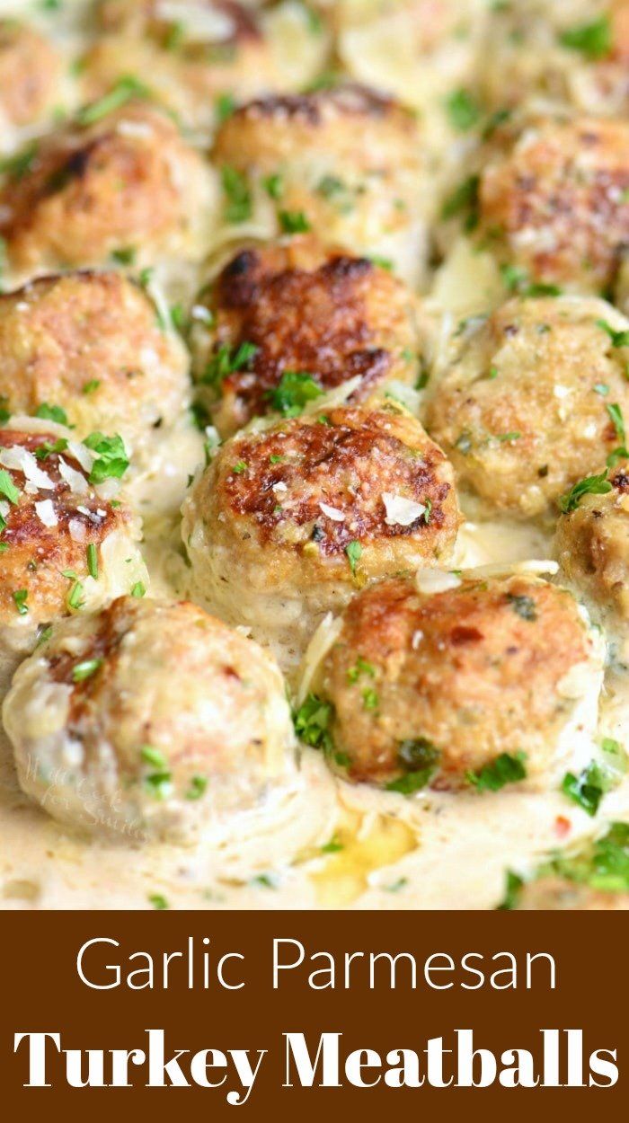 garlic parmesan turkey meatballs on a plate with text overlay that reads garlic parmesan turkey meatballs