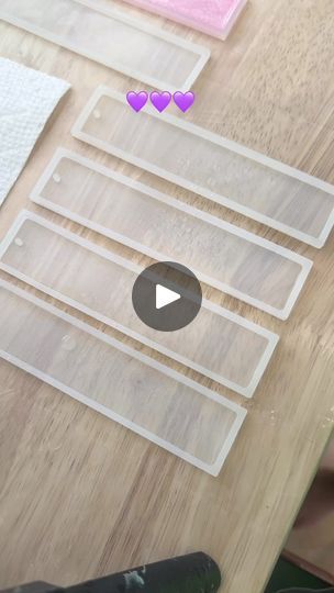 the video is showing how to cut out hearts on clear acrylic sheets for valentine's day