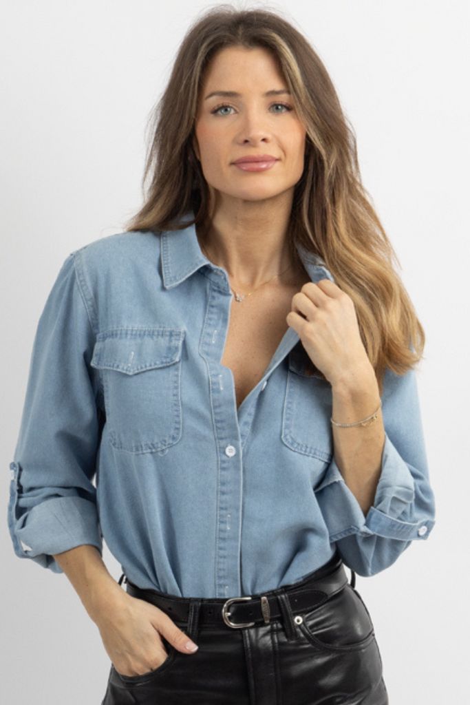 Denim Blue Button-up Workwear Blouse, Relaxed Fit Denim Blouse With Buttons, Trendy Button-up Denim Blouse, Trendy Denim Button-up Blouse, Trendy Light Wash Blouse With Pockets, Denim Button-up Blouse With Pockets, Spring Washed Button-up Blouse, Medium Wash Button-up Blouse With Pockets, Trendy Denim Blue Blouse With Pockets