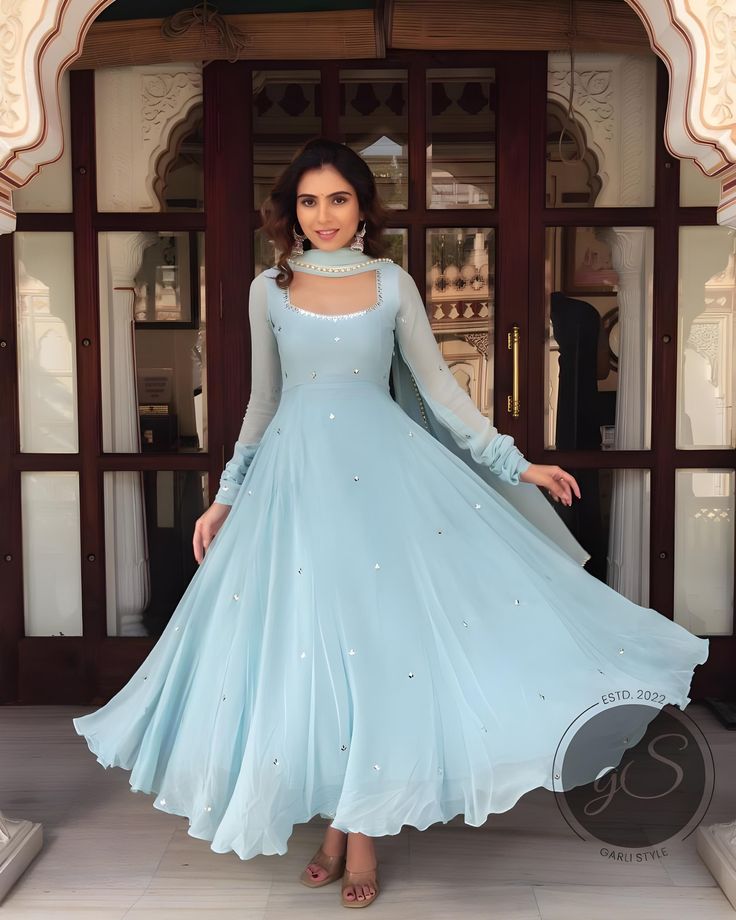 Handmade designer - Heavy Anarkali Gown Party Wear Sky  blue Hand-made mirror work Wedding Suit for Woman's Custom Stitched Designer Indian Long Dress for Girls Product Details: Kameez Fabric: Georgette  Dupatta Fabric: Georgette with lace Color - As same as in picture , also please check our color chart all colors can be possible. Size: This is custom made as per your size. Any size possible be it for kids or plus sizes women. post your order I will send you a measurements reference sheet using Sky Blue Indian Suit, Anarkali With Mirror Work, Suit Colors Women, Diwali Inspired Outfit, Gown Dress Design Indian, Sky Blue Anarkali Suits, Anarkalis For Women, Diwali Outfits For Women 2024, Gown Suits For Women