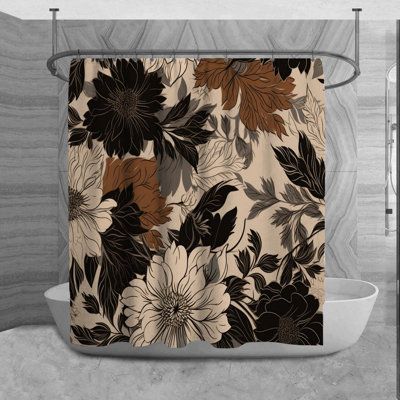 the shower curtain is decorated with black, brown and white flowers on beige background in this bathroom