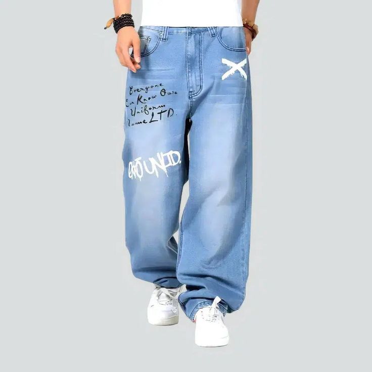 Introducing our must-have baggy men's inscribed jeans from the 2023 Summer Collection an embodiment of edgy style with a fashion twist!Why These Jeans Are a Must-HaveCrafted with precision, these jeans embody the perfect blend of laid-back mode and comfort. The baggy fit, painted details, and high-waist design give these jeans a unique edge, making them a staple piece for any vogue-forward wardrobe.Distinctive Features: Baggy Fit: These jeans are designed with a simple and informal fit, giving you the perfect street mode look. Painted Details: The intricate painted details on these jeans add a touch of edginess and uniqueness, setting you apart from the crowd. Light-Wash Perfection: The light-wash finish gives these jeans a versatile appeal, perfect for any occasion. Sanded & Whiskered: Th Street Mode, Jeans Street Style, Edgy Style, Light Blue Color, Staple Pieces, Baggy Fits, Casual Fits, Edgy Fashion, Urban Fashion