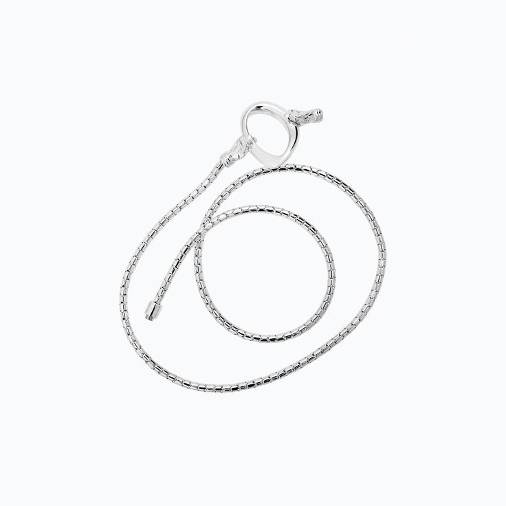 The Snake Bracelet from the Animal´s Collection by TANE is made in silver .925. With an extension of 21", the piece allows to wrap the wrist three times, achieving a final measure of 7" in diameter, thanks to its round chain that replicates the texture of a snake. At both ends, the piece is finished off with masterfully sculpted snake heads, which hold the representative link of the collection. Handmade in Mexico. TANE, the Mexican luxury brand founded in 1942, once again innovates to surprise i Snake Heads, Snake Bracelet, A Snake, The Snake, Sterling Silver Bracelet, Independent Designers Fashion, Sterling Silver Bracelets, Luxury Branding, 925 Silver