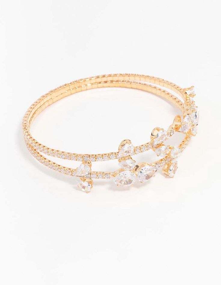 Level up your daily style with a bracelet that's the perfect finishing touch. Stack for max impact or wear alone for a polished look. This bracelet boasts a sparkling leaf motif on a luxurious gold base for a glamourous look. Material: Cubic Zirconia, Cubic Zirconia Dimensions: Diameter: 6 cm Cuff Fit Product Width: 15 mm Weight: 0g | Lovisa Cubic Zirconia Gold Leaf Bangle Bracelet Leaf Motif, Daily Style, Polished Look, Gold Leaf, Level Up, Bangle Bracelet, Daily Fashion, Bangle Bracelets, Cubic Zirconia