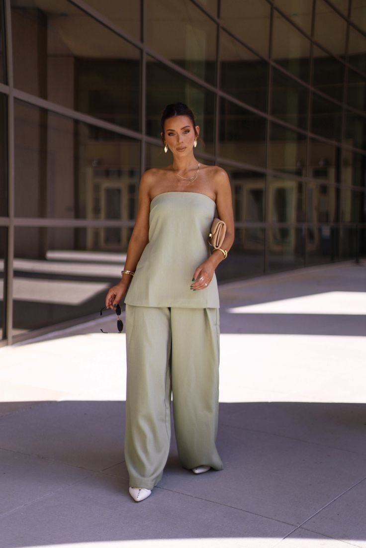 Introducing our So Iconic Pant, a must-have for NYC fashion lovers. Featuring stunning pleated details, high waisted design, and oversized silhouette, these pants exude chic and sophistication. With a relaxed fit and oversized style, they offer both comfort and elevated style, perfect for any occasion from bridal to workwear. Upgrade your wardrobe with these trendy and classy pants that combine comfort and style effortlessly. * So Iconic Top sold separately Self 100% Polyester Lining 100% Polyester Hand wash cold. Classy Pants, Elevated Style, Oversized Style, Nyc Fashion, Oversized Silhouette, Dresses Xs, Fashion Lover, Work Wear, Hand Wash