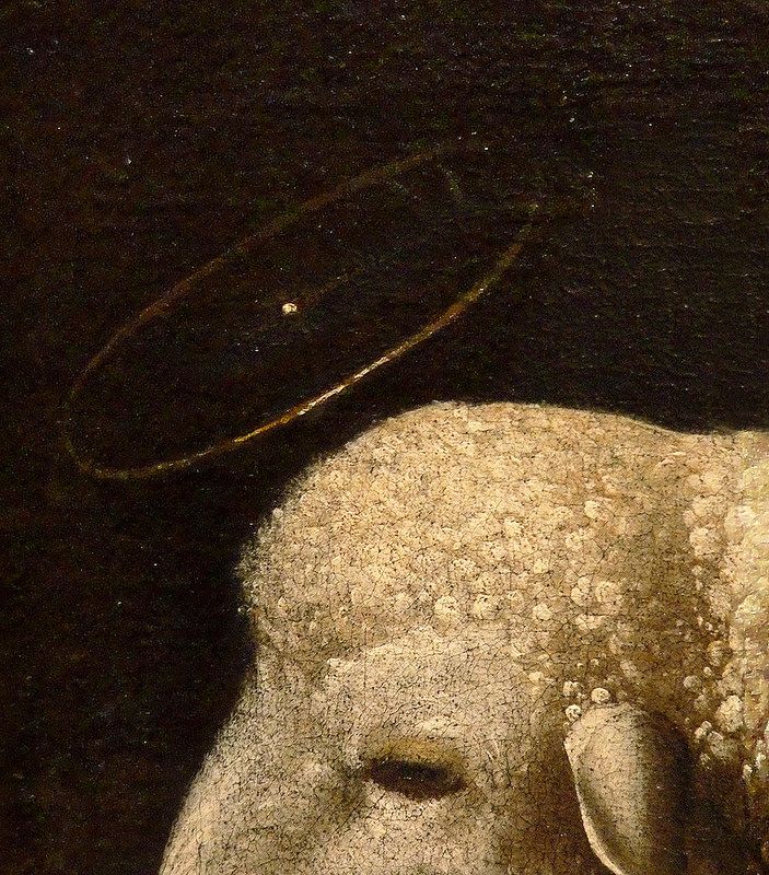 a painting of a sheep with a halo on it's head