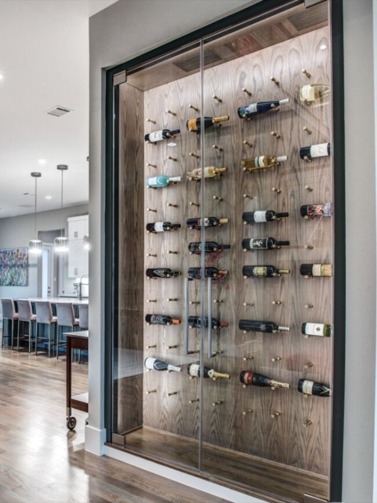 a wine rack in the middle of a room