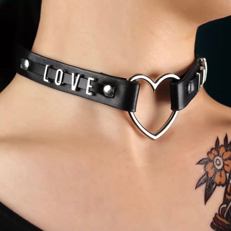 Black Leather Choker Necklace With Metal Heart One Size: Length: Approximately 40cm Pendant: Approximately 2cm -Pu Leather -Metal Heart -Metal “Love” At Both Side -Adjustable Buckle -Soft And Lightweight Brand New Cute Adjustable Black Choker, Black Heart Pendant Choker With Charm, Black Heart Pendant Choker With Heart Charm, Personalized Black Jewelry For Party, Punk Heart-shaped Choker As A Gift, Punk Style Heart Shaped Choker For Gifts, Punk Style Heart Shaped Choker As Gift, Punk Style Heart Shaped Choker Gift, Black Heart Charm Choker For Valentine's Day