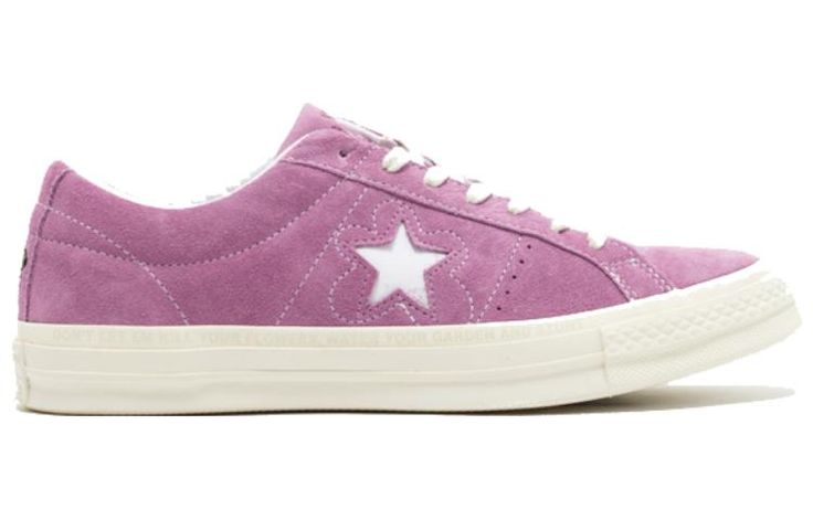 Who says you can't have style and comfort on the golf course? With the Converse Golf le Fleur x One Star Ox, Tyler, the Creator brings his signature style to your game. The premium suede upper in Fuchsia Glow is accented by the iconic One Star logo in white. The flower stitching around the logo adds a pop of color and personality, while the Golf le Fleur branding on the tongue completes the look. Whether you're teeing off or just hitting the links with friends, this shoe has you covered in style Converse Golf Le Fleur, Tyler The Creator Golf, Glow Shoes, Golf Wang, Limited Edition Sneakers, Converse One Star, Star Logo, Tyler The Creator, Converse Sneakers