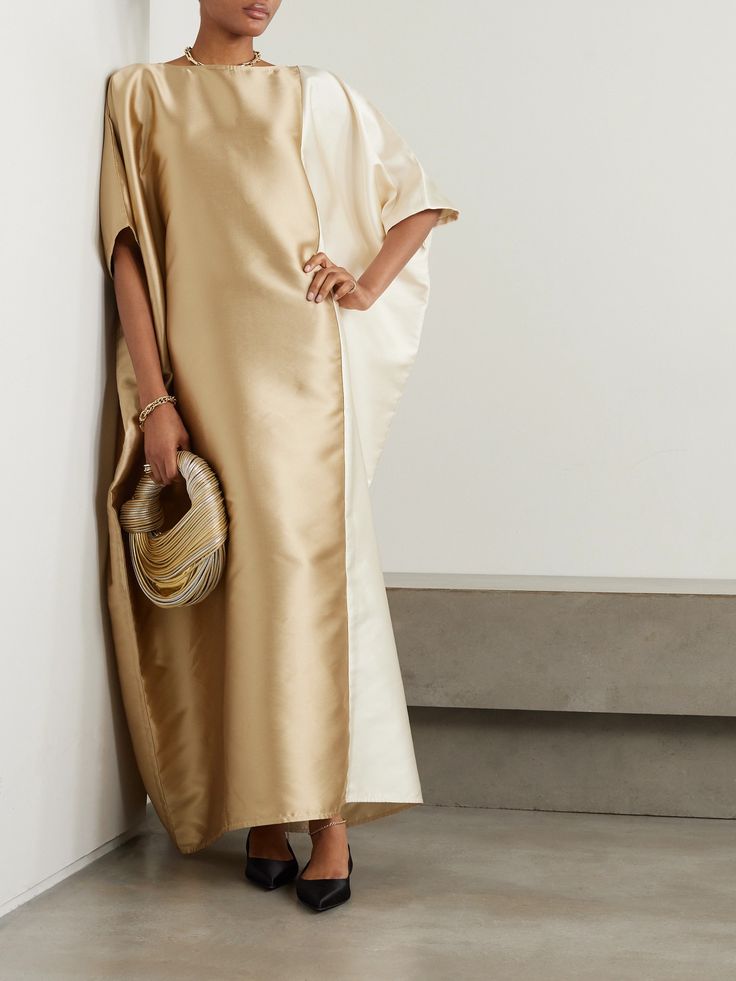 Dima Ayad's affinity for metallics ensures you won't go unnoticed in this kaftan. It's made from two-tone satin-twill that drapes effortlessly over your frame and has cascading sleeves. Style yours with gold bangles. Satin Kaftan Dress, Dramatic Ethereal, Ramadan Abaya, School Moodboard, Gold Silk Dress, Hipster Chic, Designer Maxi Dress, Sleeves Style, Abaya Designs