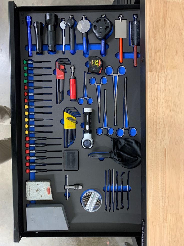 a toolbox with tools and other items in it