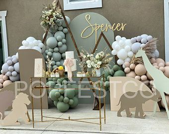 an outdoor display with balloons and animals