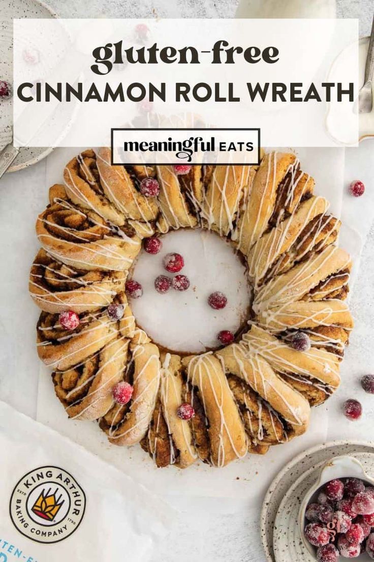 the gluten free cinnamon roll wreath is ready to be eaten with cranberries