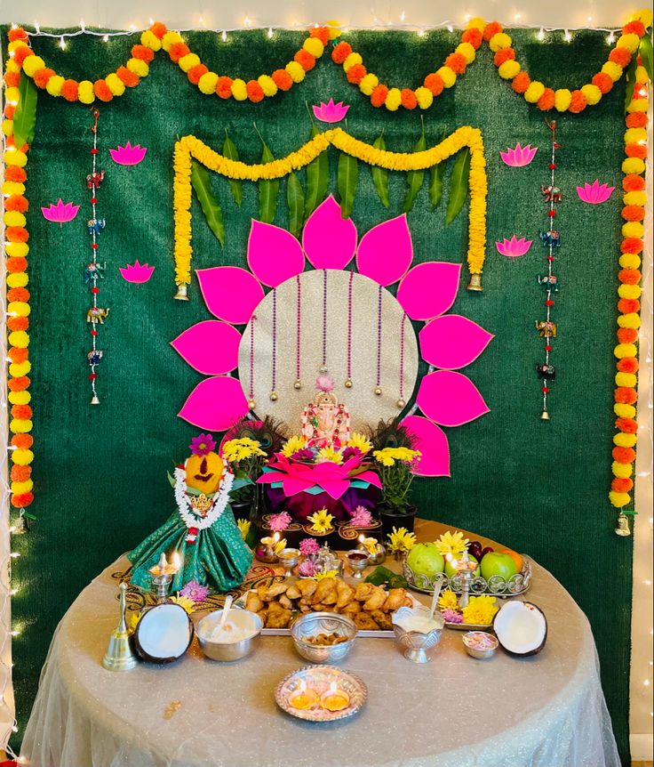 the table is covered with food and decorations