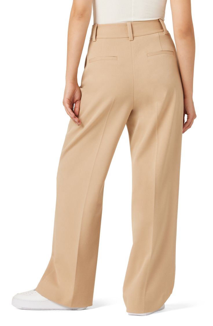 These wide-leg trousers are fashioned from smooth woven fabric and gently pleated at the waist to further the flowy fit. 30" inseam; 22" leg opening; 13 1/2" front rise; 17 1/2" back rise (size 8) 63% polyester, 32% rayon, 5% elastane Machine wash, line dry Imported Favorite Daughter, Wide Leg Trousers, Woven Fabric, Khaki Pants, Casual Wear, Wide Leg, Nordstrom, Trousers, Pants