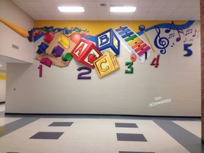 an empty room with colorful letters and numbers painted on the wall