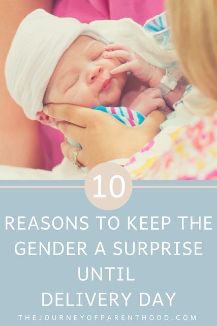 a woman holding a baby with the words 10 reasons to keep the genderer a surprise until delivery day