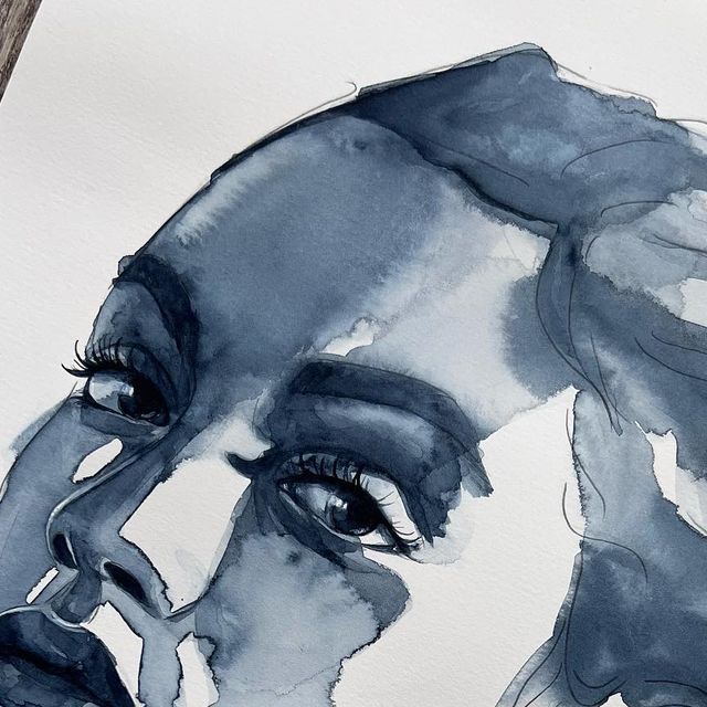 a watercolor painting of a woman's face with her hand on her chin