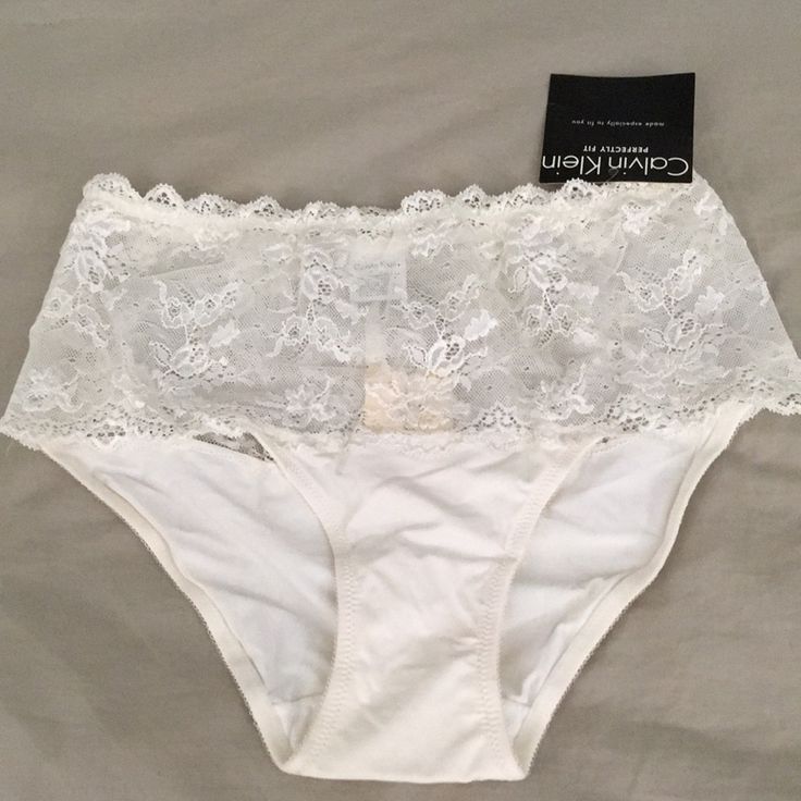 Calvin Klein Panty Elegant Brief Bottoms For Loungewear, Calvin Klein Briefs For Loungewear, Calvin Klein Brief Bottoms For Loungewear, Calvin Klein Cotton Brief Bottoms, Cream Lace Trim Bottoms For Loungewear, Beige Lace Bottoms For Daywear, White Lace Loungewear Bottoms, Cream Stretch Lace Bottoms, White Feminine Bottoms For Daywear