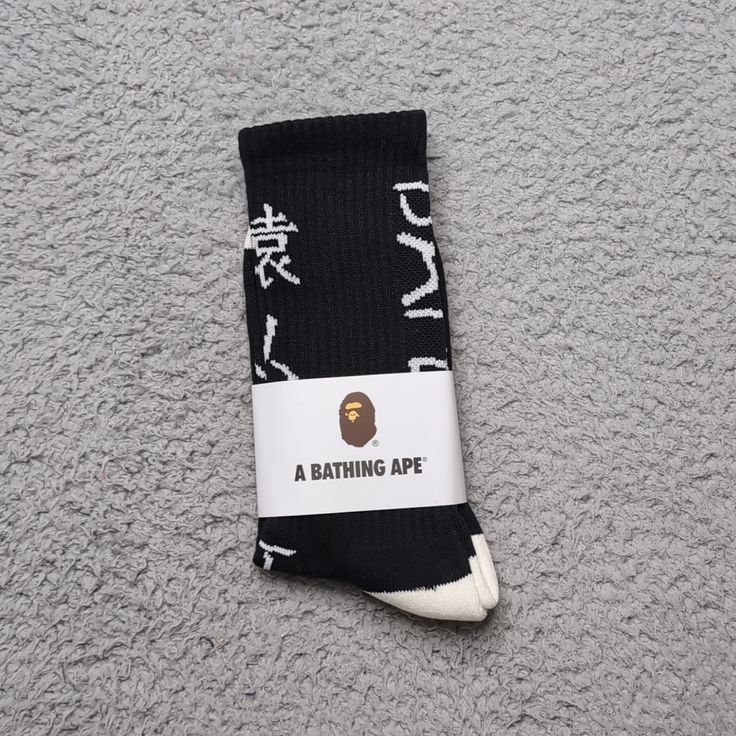 A Bathing Ape Crew Socks Japanese Writing Mens Womens Unisex Size: One Size Fits All Color: Black Off White (White Heel & Toe) Brand New In Packaging. Fast Shipping! 1 Day Shipping And Handling. Black Socks For Streetwear In Winter, Sporty Winter Socks For Streetwear, Casual Black Socks For Streetwear, Black Socks For Winter Streetwear, Black Casual Socks For Streetwear, Casual Cotton Socks For Streetwear, Comfortable Breathable Socks For Streetwear, Casual Cotton Streetwear Socks, Bape Socks